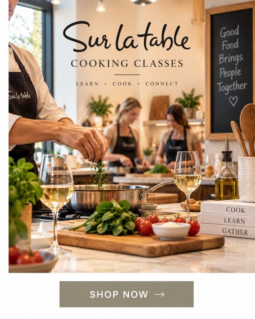 Sur La Table cooking class with a chef preparing a meal and participants cooking together