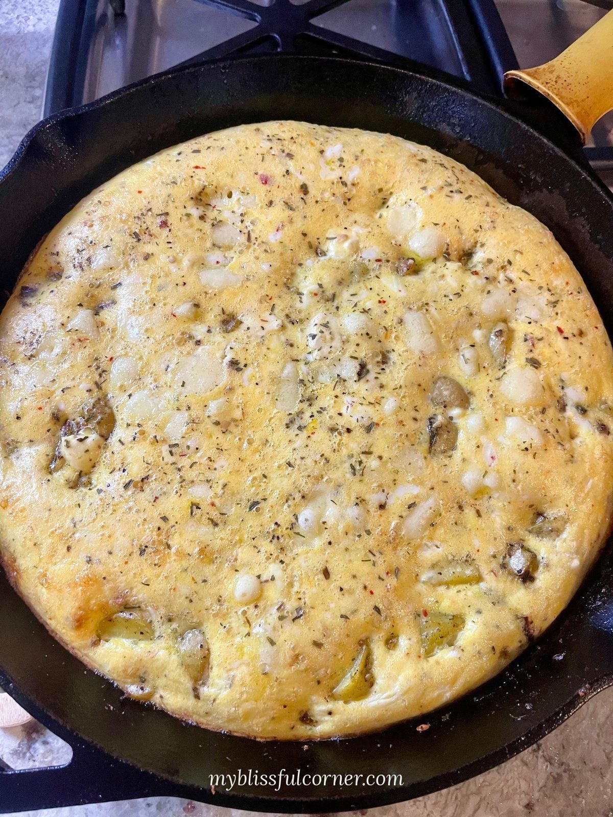 oven baked frittata in cast iron skillet